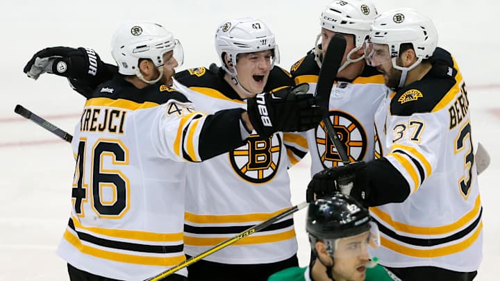 Marchand scores 2, Bruins rally to beat Stars 7-3