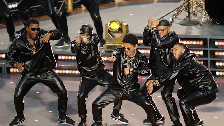 Halftime Review: Coldplay lets guests overshadow band