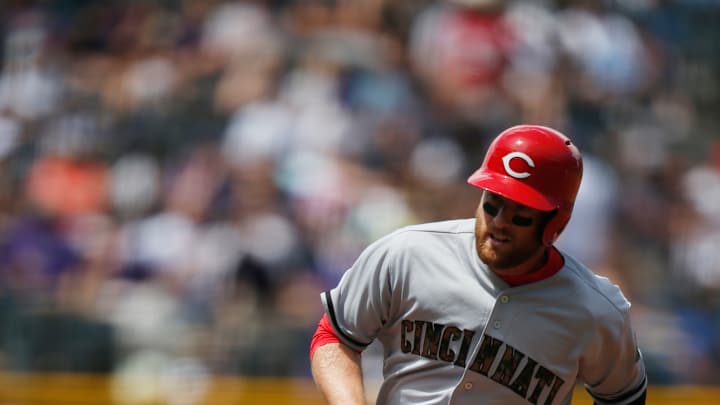 Duvall hits 2 of Reds' 5 homers in 11-8 win over Rockies