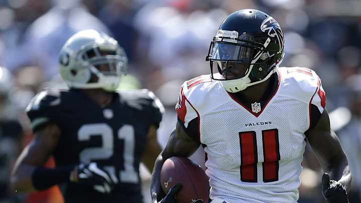 Ryan throws 3 TD passes to lead Falcons past Raiders 35-28