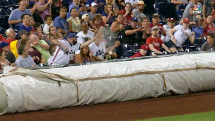 Beer bottle saves dude from getting drilled by foul ball