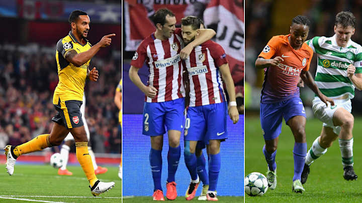 Walcott leads Arsenal, Atletico bests Bayern again in Champions League Walcott leads Arsenal, Atletico bests Bayern again in Champions League