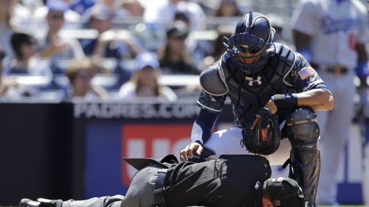 Plate umpire Rackley leaves after getting hit by foul bunt