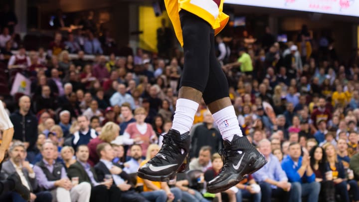 LeBron, Cavs clinch top seed in East with win over Hawks