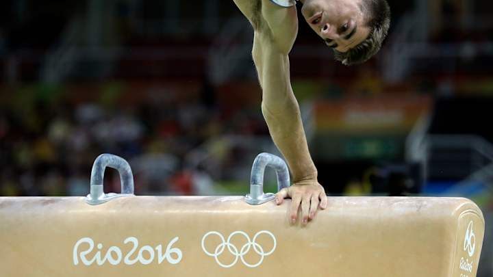 Max Whitlock gives Britain 1st gold medals in gymnastics