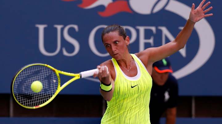 The Latest: Vinci, woman who beat Williams in '15, wins