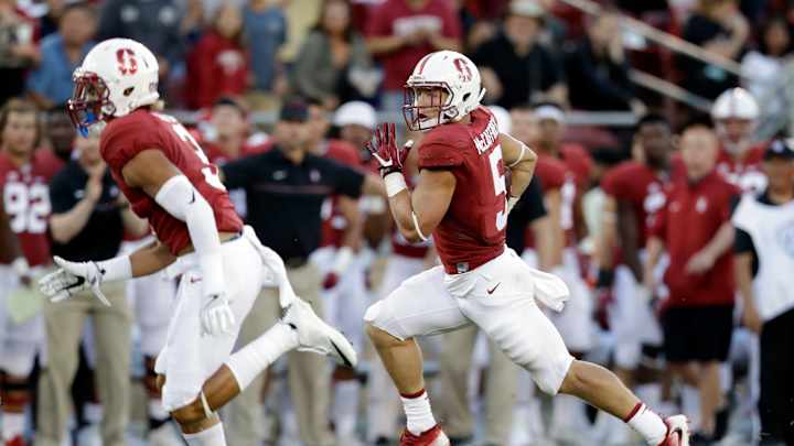 McCaffrey's 2 TDs lead No. 8 Stanford past Kansas St. 26-13
