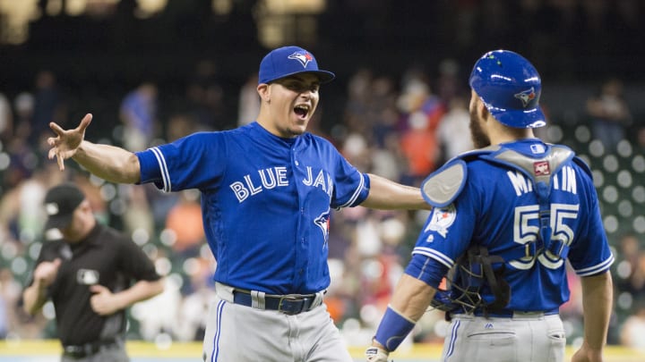 Happ wins 9th straight decision as Blue Jays beat Astros 4-1