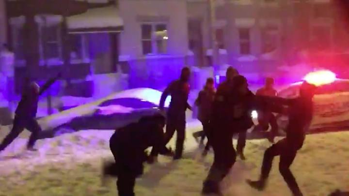 Watch: Police join pick-up football game in streets of Washington, D.C.
