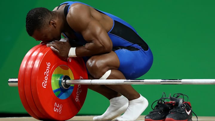Colombian weightlifter wins gold, retires immediately after