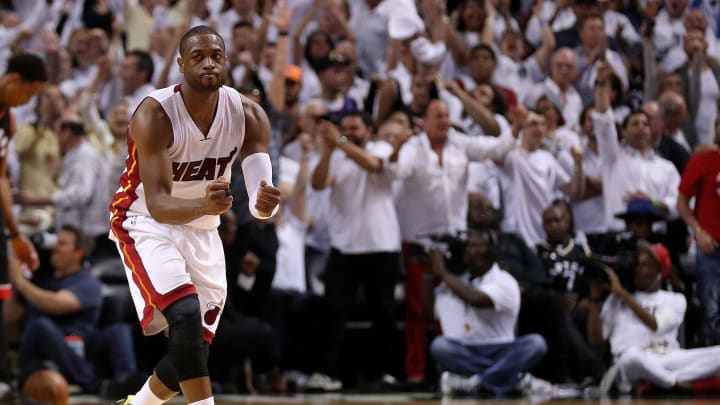 Wade gets 30, Heat rally and beat Raptors 94-87 in OT