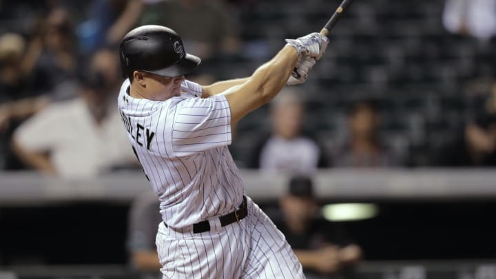 Hundley's grand slam helps Rockies beat Diamondbacks, 14-7