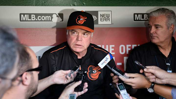 Orioles start spring training with unfinished business