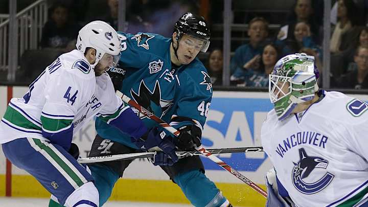 Hamhuis, Markstrom lead Canucks past Sharks 4-2