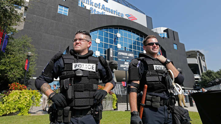 The Latest: Protesters kneel during NFL game anthem