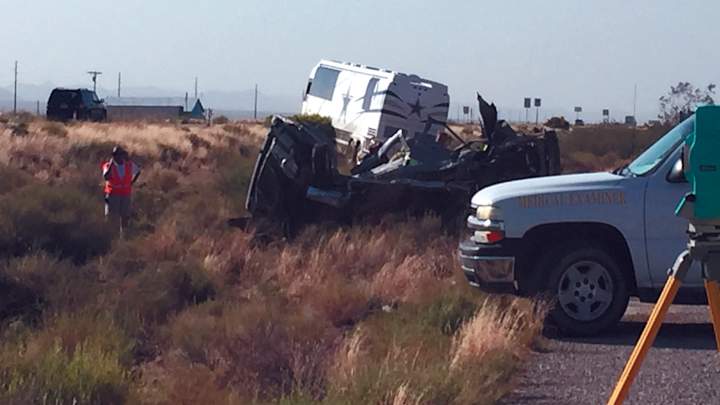 The Latest: Van in wreck with Cowboys bus was turning left