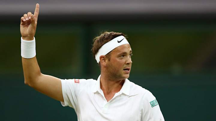 World's No. 772 tennis player plays Roger Federer in Roger Federer shirt