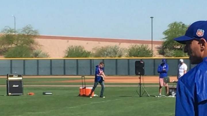 The Cubs had a live guitarist play during their spring training warmups