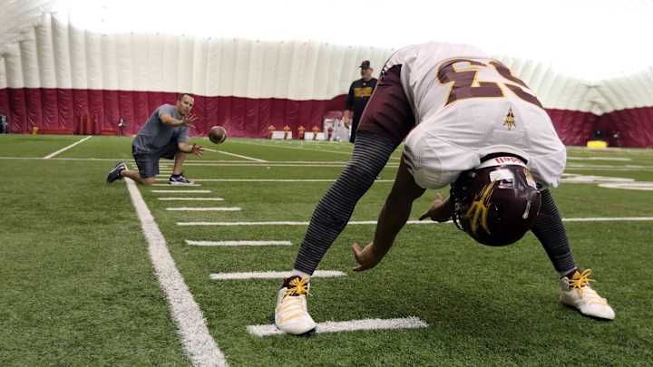 Face protection the priority when catching long snaps