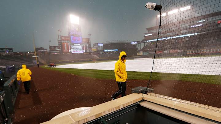 Rockies lose to Tulo, Blue Jays after intense weather delay