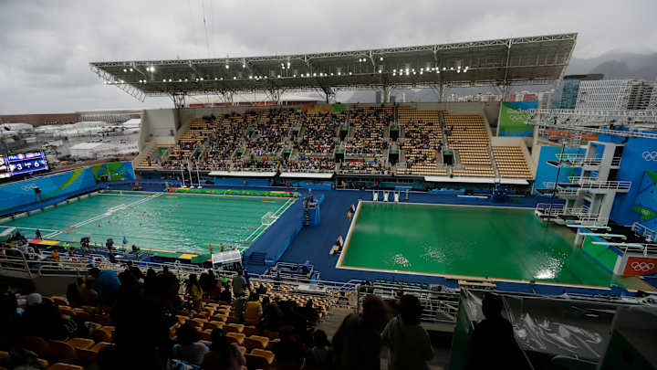 The Latest: Olympic officials race to drain murky-green pool The Latest: Olympic officials race to drain murky-green pool