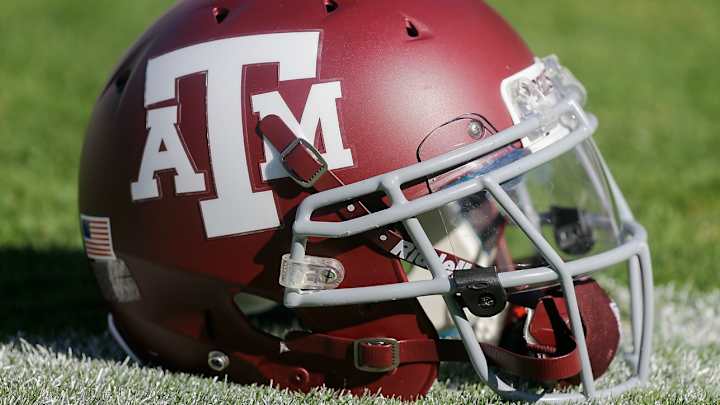 Son charged with killing of ex-Texas A&M star Antonio Armstrong, wife