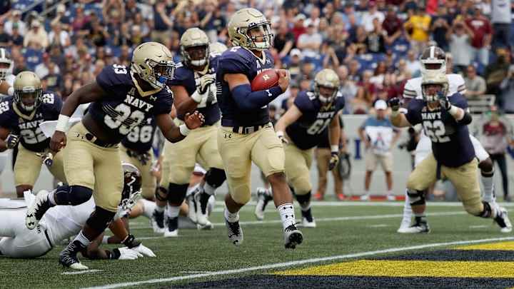 After injury to starter Smith, Navy brings in freshman quarterback from stands After injury to starter Smith, Navy brings in freshman quarterback from stands