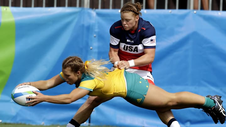 Aussies score late for draw with US, both advance in Rio