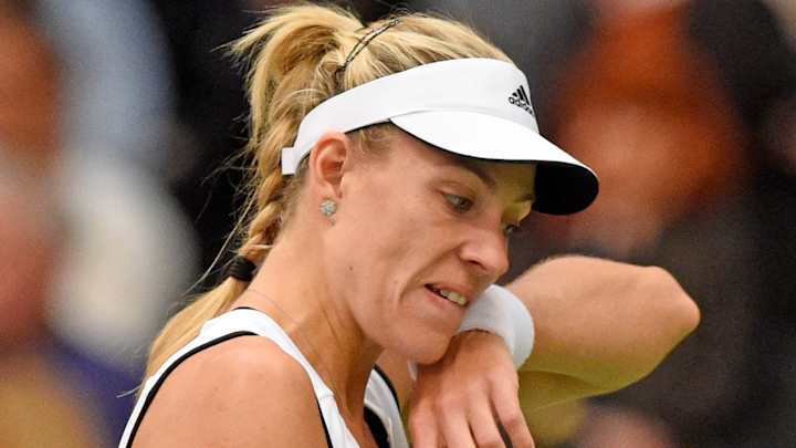 Kerber loses in 1st match since winning Australian Open