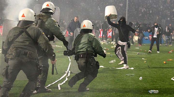 Greek Cup canceled after fans light flares, invade pitch Greek Cup canceled after fans light flares, invade pitch