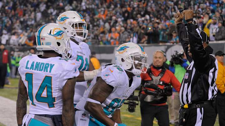 Dolphins assured of 1st winning season since 2008