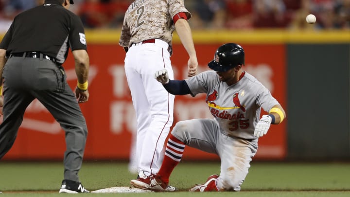 Reds rally to beat Cardinals 3-2 on Suarez's single in 9th