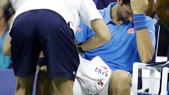 The Latest: Vinci cruises past McHale into US Open 3rd round