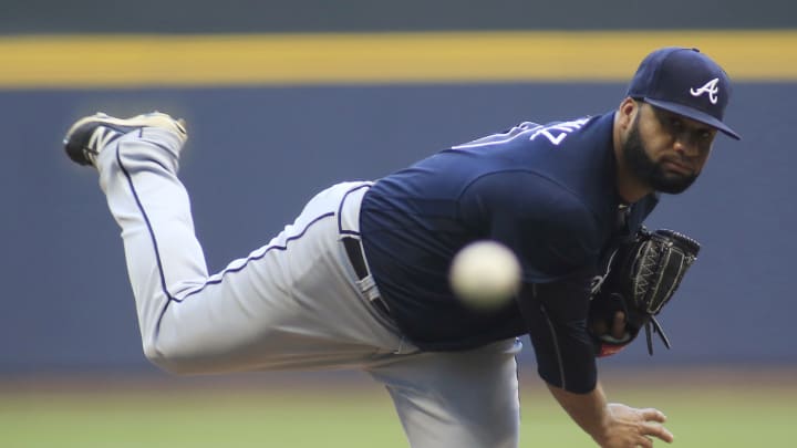 Carter goes deep, Brewers beat Braves 4-3