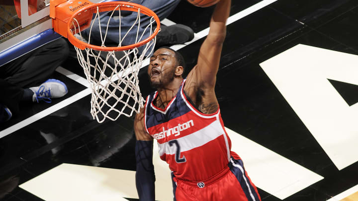 Wall helps Wizards beat Magic for 12th straight time, 105-99