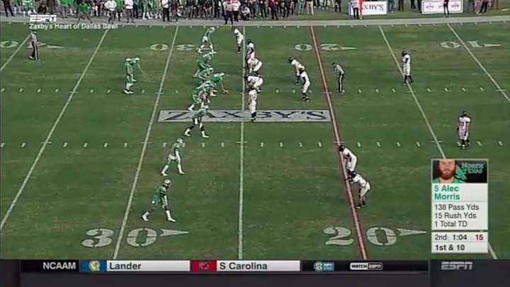 North Texas running back causes his quarterback to miss snap by vomiting next to him