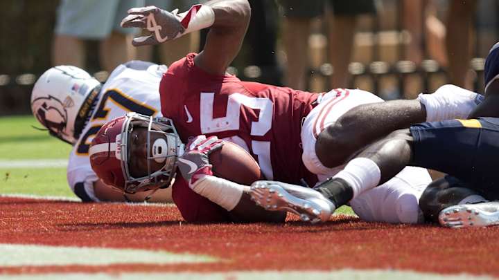 Bama running game rolling along with Harris, freshmen