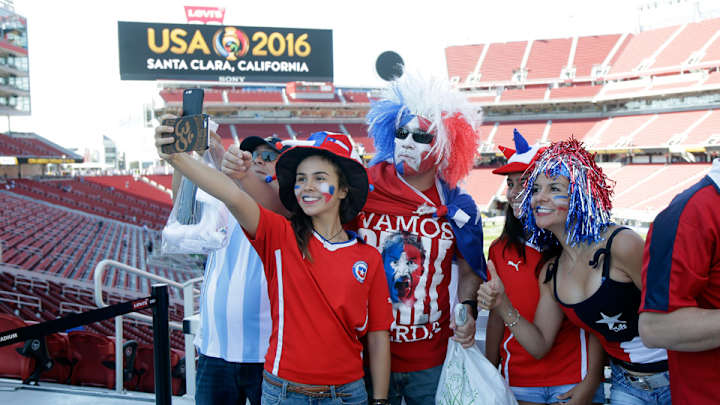 Pitbull track plays as players, fans sing end of Chile national anthem