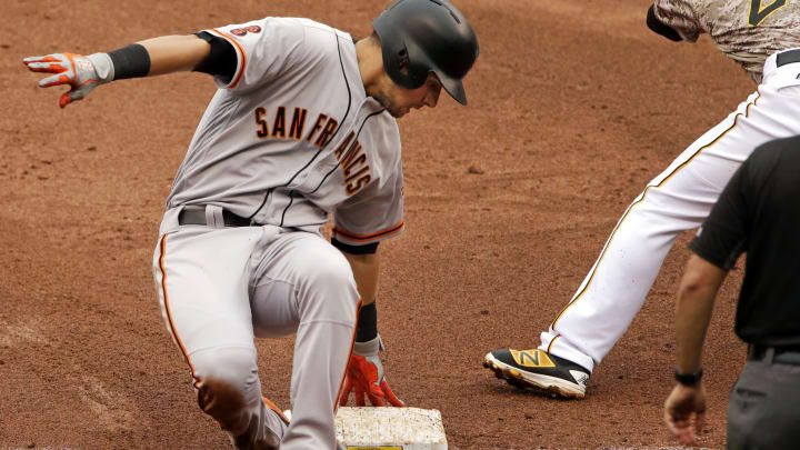 Panik, Giants beat Pirates for 12th win 14 games
