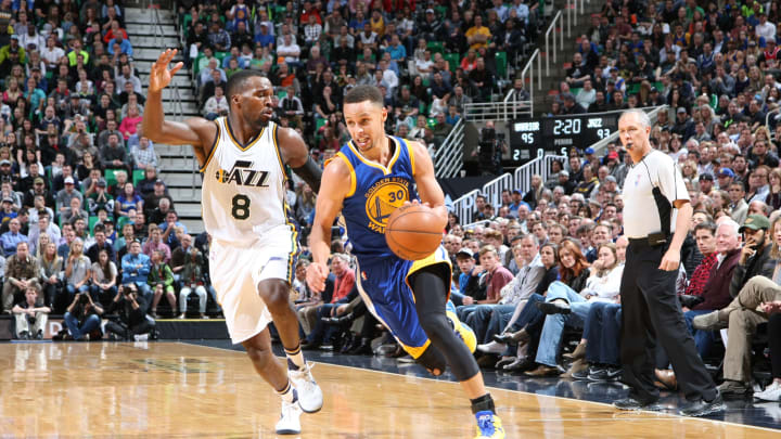 Curry scores 31, Warriors beat Jazz 103-96 in OT for No. 68
