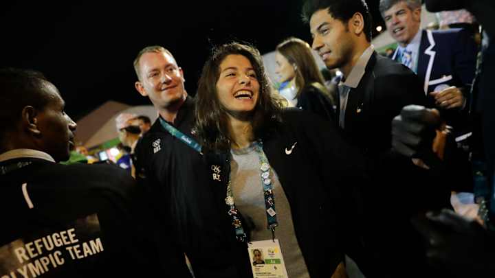 Syrian refugee swimmer wins heat, won't advance in butterfly