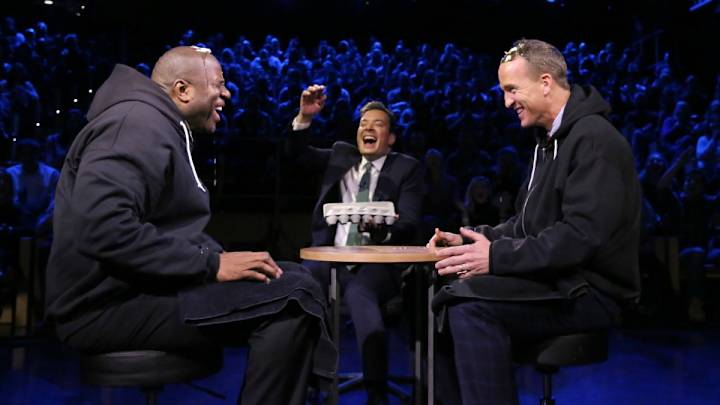 Watch: Peyton Manning, Magic Johnson smash eggs on their heads