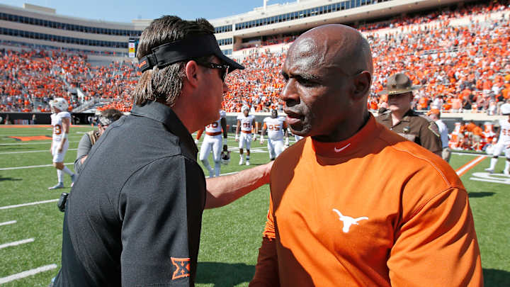 Texas' Strong, Oklahoma's Stoops need victory to calm fans Texas' Strong, Oklahoma's Stoops need victory to calm fans