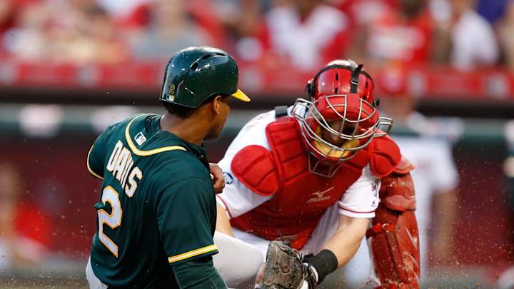 Reds rally for 1st interleague win, 2-1 over Athletics