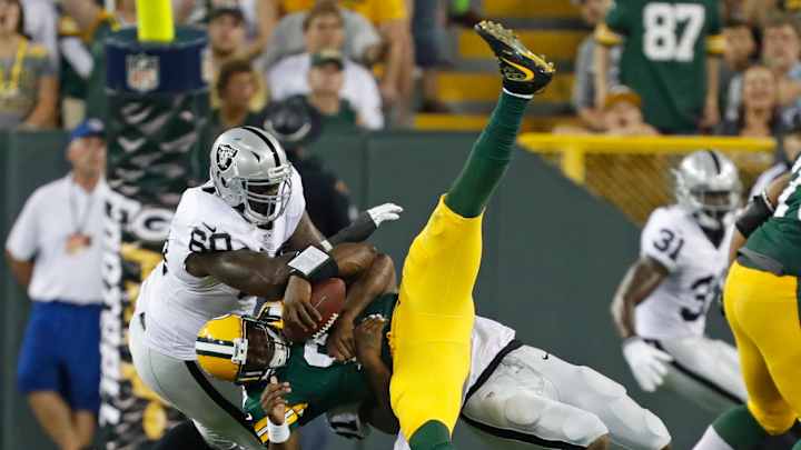 Lacy helps power Packers past Raiders 20-12