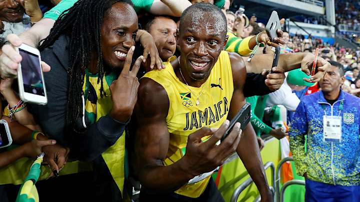Usain Bolt makes history before finale as Ashton Eaton defends decathlon title
