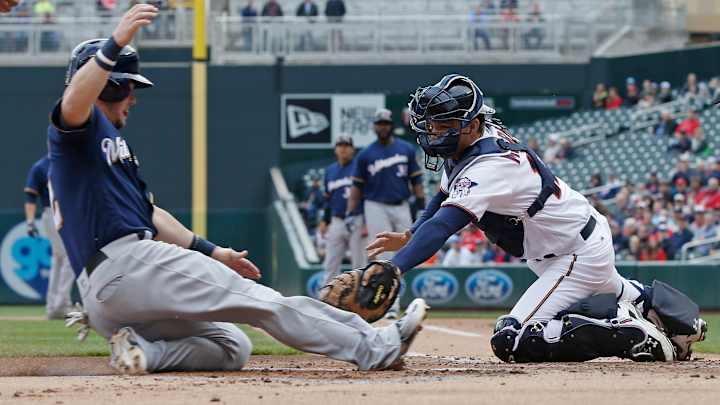 Gennett singles in 9th, Brewers stop Twins' win string at 4