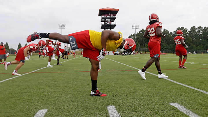 Wolfpack open practice with new offense, battle for QB job Wolfpack open practice with new offense, battle for QB job