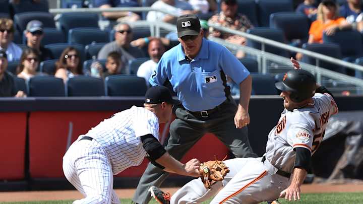 AP source: Yanks discussing deal to send Chapman to Cubs