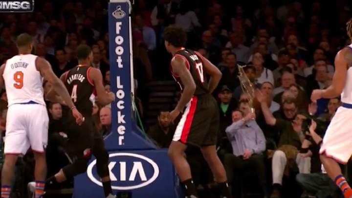 Knicks fan sees basketball headed his way, throws his beer in the air Knicks fan sees basketball headed his way, throws his beer in the air